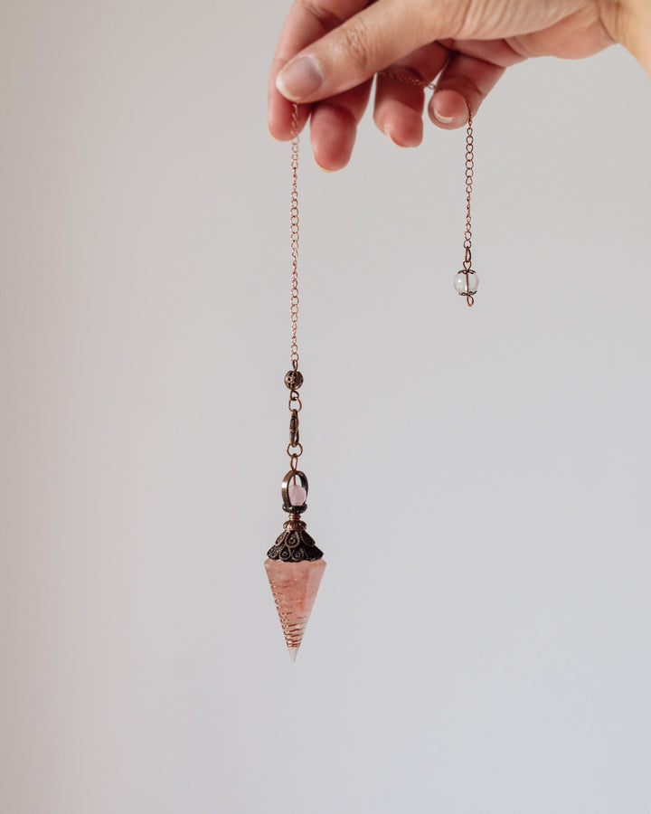 Pendule en pierres de Quartz Rose
