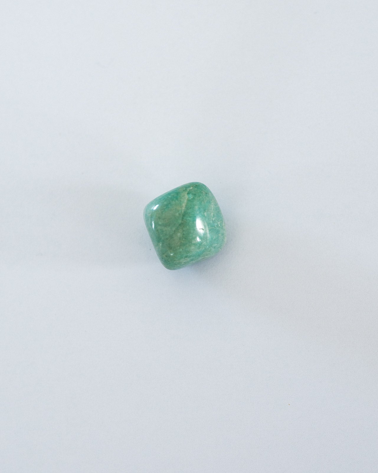 Une pierre roulée Amazonite